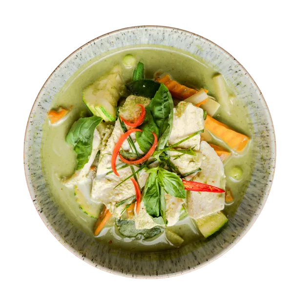 Chicken green curry with rice and crispy noodle.
